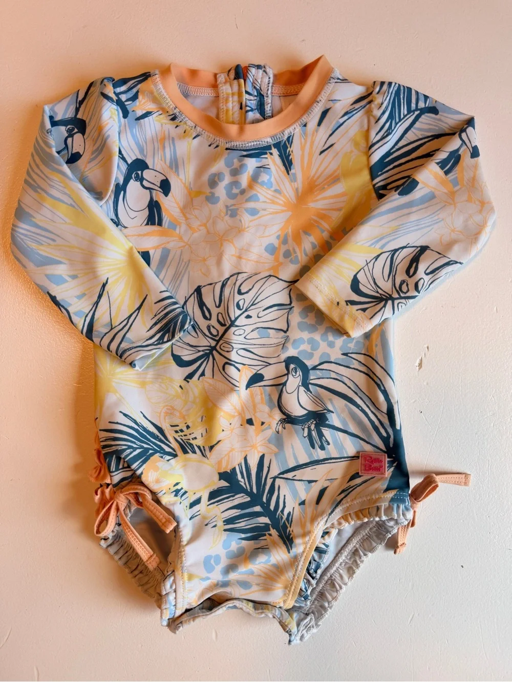 Ruffle Butts Long Sleeve One-Piece Swimsuit in Blue, Yellow, Peach